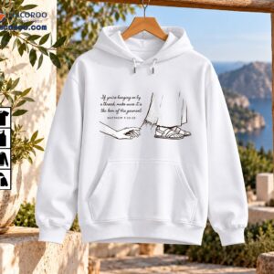 Christian shirt design with a reaching hand, robe hem, sandals, and Matthew 9:20-22 faith message