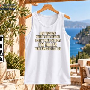 Funny height quote shirt with cream and black lettering reading Just Because You’re Taller Than Me