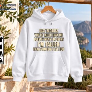 Funny height quote shirt with cream and black lettering reading Just Because You’re Taller Than Me
