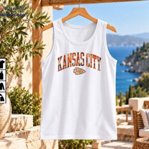 Kansas City Chiefs fall camo shirt design with arched KANSAS CITY lettering and beige KC arrowhead emblem