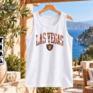 Las Vegas Raiders fall camo wordmark graphic with distressed orange and black lettering and vintage pirate shield
