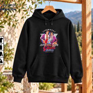 Legendary Gibson Brothers shirt featuring Robert and Ricky in purple jackets with retro wrestling graphics
