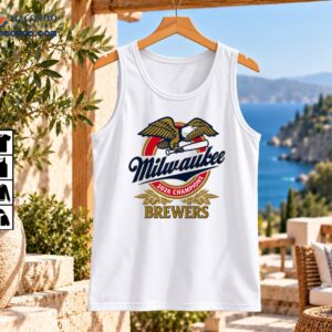 Milwaukee 2026 Champions Brewers design with a golden eagle, baseball bat, red crest, and navy script lettering