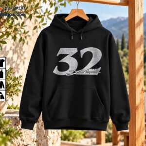 Silver distressed number 32 baseball graphic with a flowing signature-style detail underneath