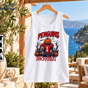 Penguins Football Trick Or Treat Halloween Pumpkin Player Shirt 2 Penguins Halloween football graphic with pumpkin-headed player wearing number 1, bats, haunted trees and Trick or Treat text