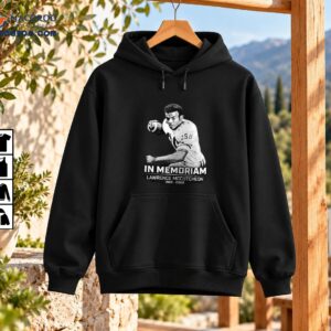 Black and white memorial football graphic featuring an action portrait, IN MEMORIAM lettering, Lawrence McCutcheon, and dates.