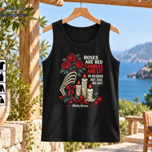 Gothic red roses held by a skeletal hand with three lit candles and Do No Harm But Take No Shit quote