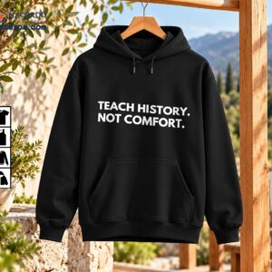 Teach History Not Comfort shirt design with bold white uppercase lettering and a distressed vintage-style finish