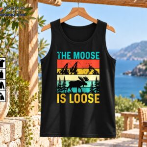 Vintage The Moose Is Loose graphic with black moose silhouette, pine forest, mountains, and colorful retro stripes