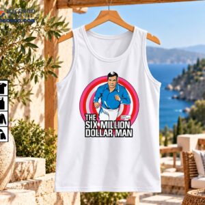 Six Million Dollar Man Shirt featuring Colonel Steve Austin running in blue and white with pink and red rings and bold retro lettering