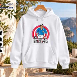 Six Million Dollar Man Shirt featuring Colonel Steve Austin running in blue and white with pink and red rings and bold retro lettering