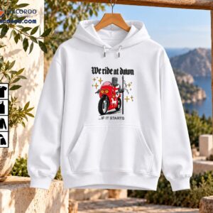 We Ride At Dawn If It Starts graphic with armored medieval knight riding a red motorcycle and golden stars