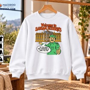 Welcome To Saddam Hussein’s Cheesecake Factory Funny Cartoon Shirt