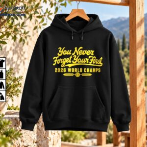 Gold You Never Forget Your First 2026 World Champs baseball shirt graphic with vintage script and baseball emblem